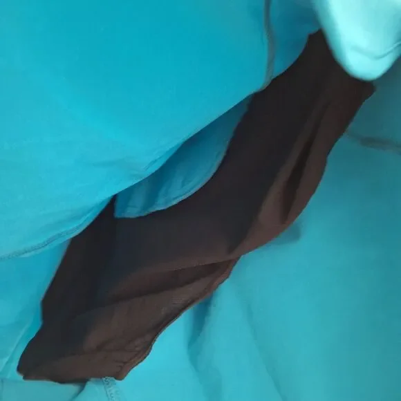 Saucony outpace 2.5" split short turquoise medium - Picture 2 of 8